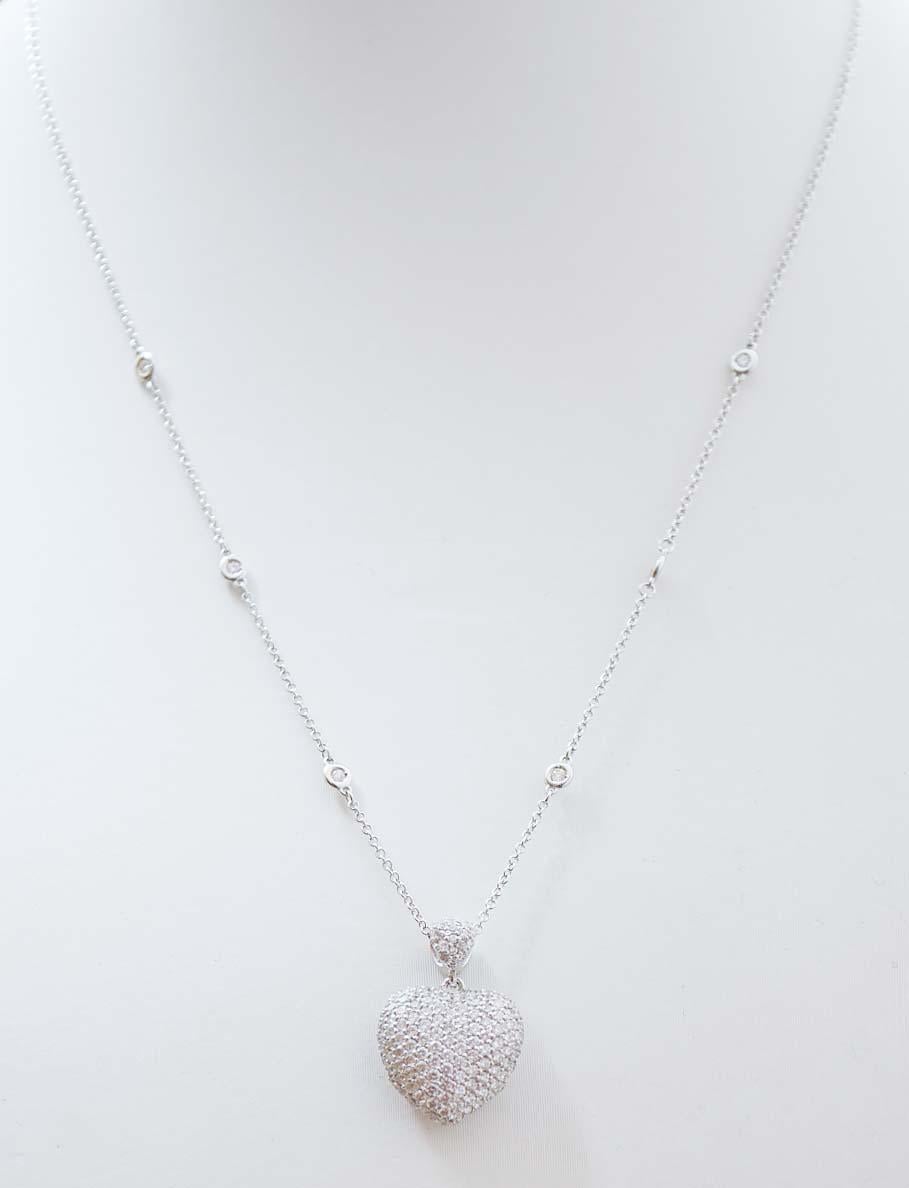 Gorgeous heart shape pendant necklace in 18 karat white gold studded with diamonds. Along the chain, six diamonds.
The chain is included.
Diamonds 2.18 ct
Total Weight 6.30 gr
RF     G    HIFI
RK.GGAI92
Minimum Length Chain 40
Maximum Length Chain