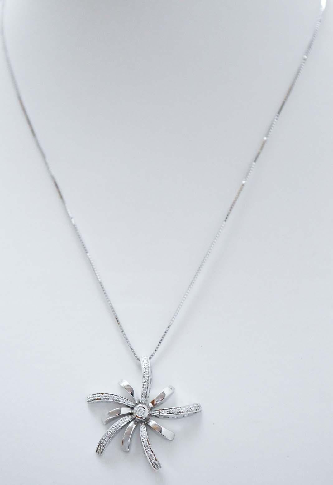 Elegant pendant necklace in 18 kt white gold structure mounted with diamonds. The chain is included.
Diamonds 0.21 ct
Total Weight 9.00 gr
RF    G    FRAH
RK.AHIO80
Length Chain 39.5 cm
Heigth Pendant 3.1 cm
Width Pendant 3 cm

For any informations,