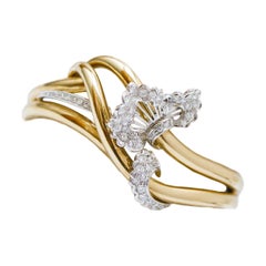 Diamonds, 18 Karat Yellow Gold and White Gold Bracelet.