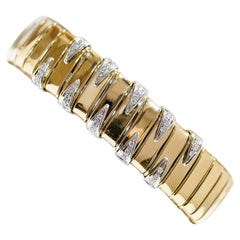 Vintage Diamonds, 18 Karat Yellow Gold and White Gold Tubogas Bracelet.