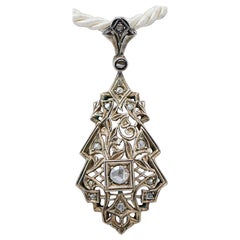 Diamonds, 18 Kt and 9 Kt White Gold Pendant