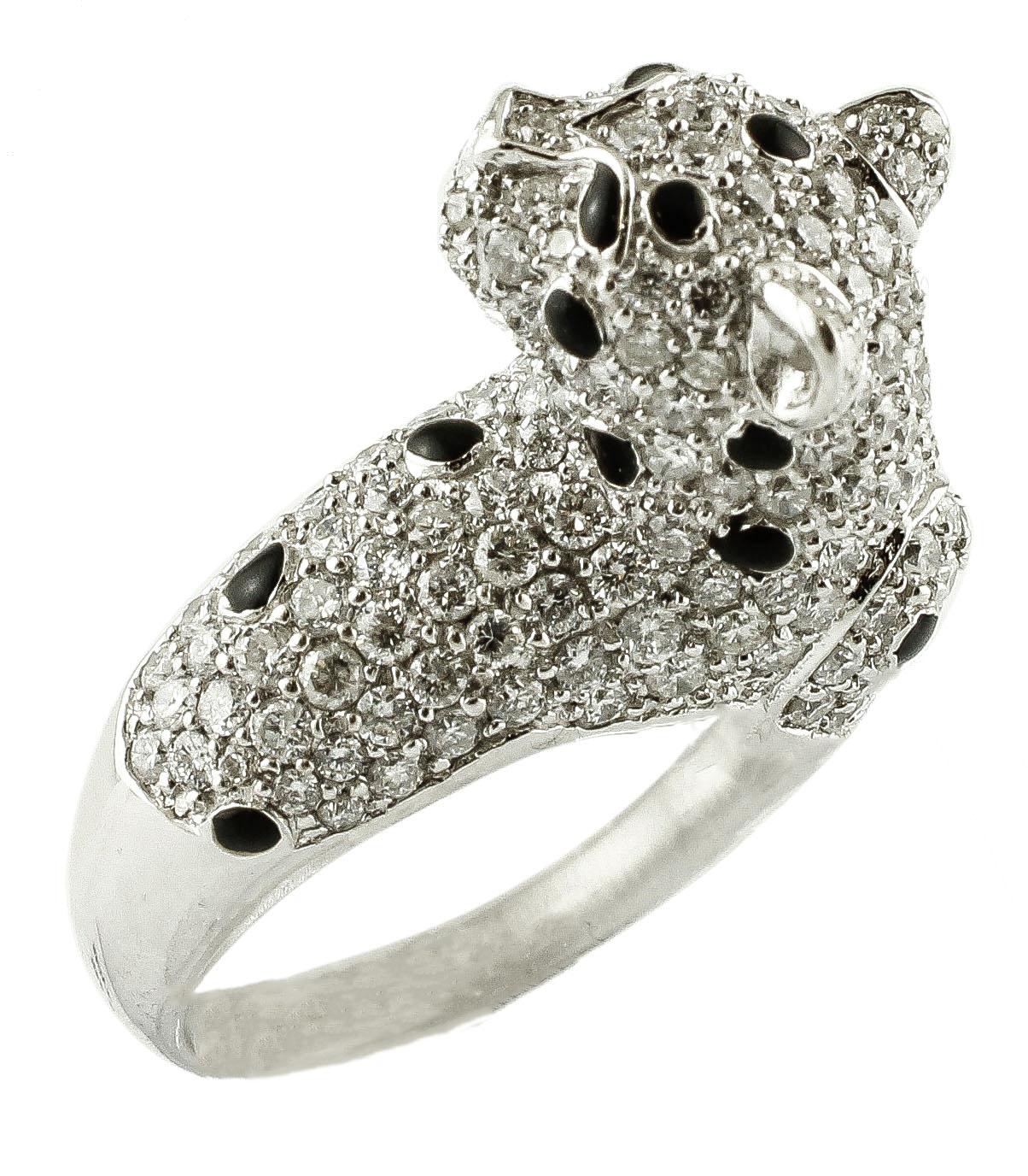Stunning ring in 18k white gold structure realized with cheetah design totally studded with beautiful white diamonds and black enamel gold. 
The ring has Italian origin from the 1990s
Diamonds 2.79 ct
Total weigth 13.99 g
Italian size 14 / french 54
