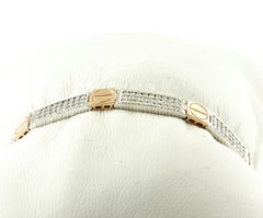 Diamanti, bracciale a fascia in oro bianco e rosa 18 carati