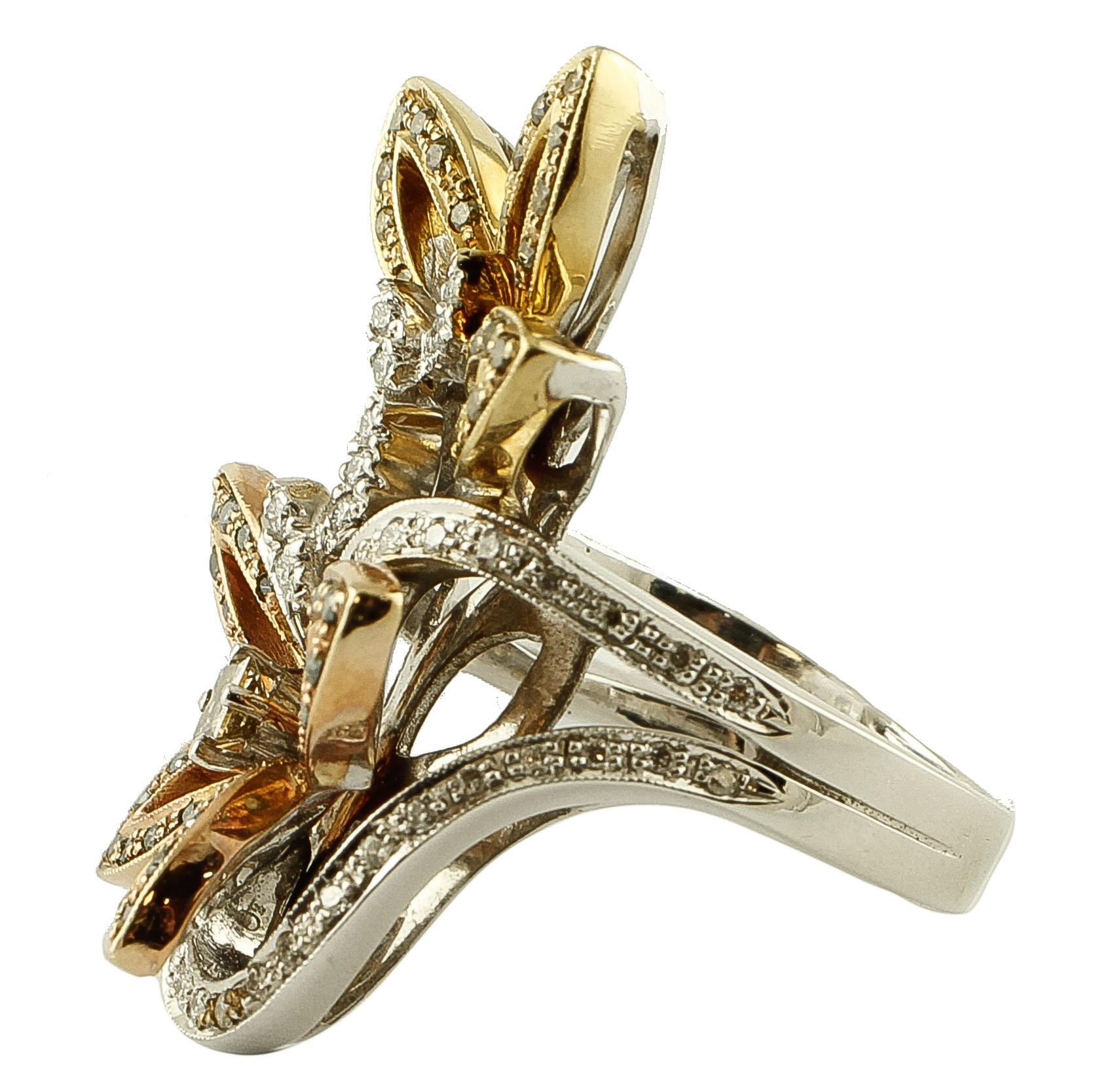 Beautiful retro ring in 18k white and yellow gold structure with flower design studded with diamonds. 
This ring is totally handamade by Italian master goldsmiths. 
Diamonds 0.93 ct
Total weight 15.1 g
Ring Head height 3.2 cm
Italian size 14
French