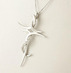 Diamonds, 18 Karat White Gold Stylized Cross Pendant Necklace