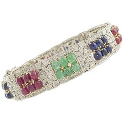 Diamonds 4.10 Carat, Rubies Blue Sapphires Emeralds 33.13 Carat Gold Bracelet