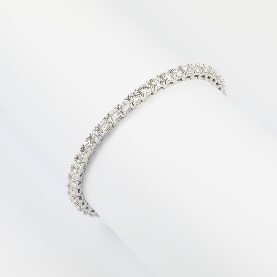  Classic Diamond Tennis Bracelet, featuring:
✧ 44 natural round diamonds F-G color VS+ weighing approx. 9.46 carats
✧ Approximately 14.5 grams of 14K White Gold 
✧ Free appraisal included with your purchase
✧ Comes with beautiful packaging and