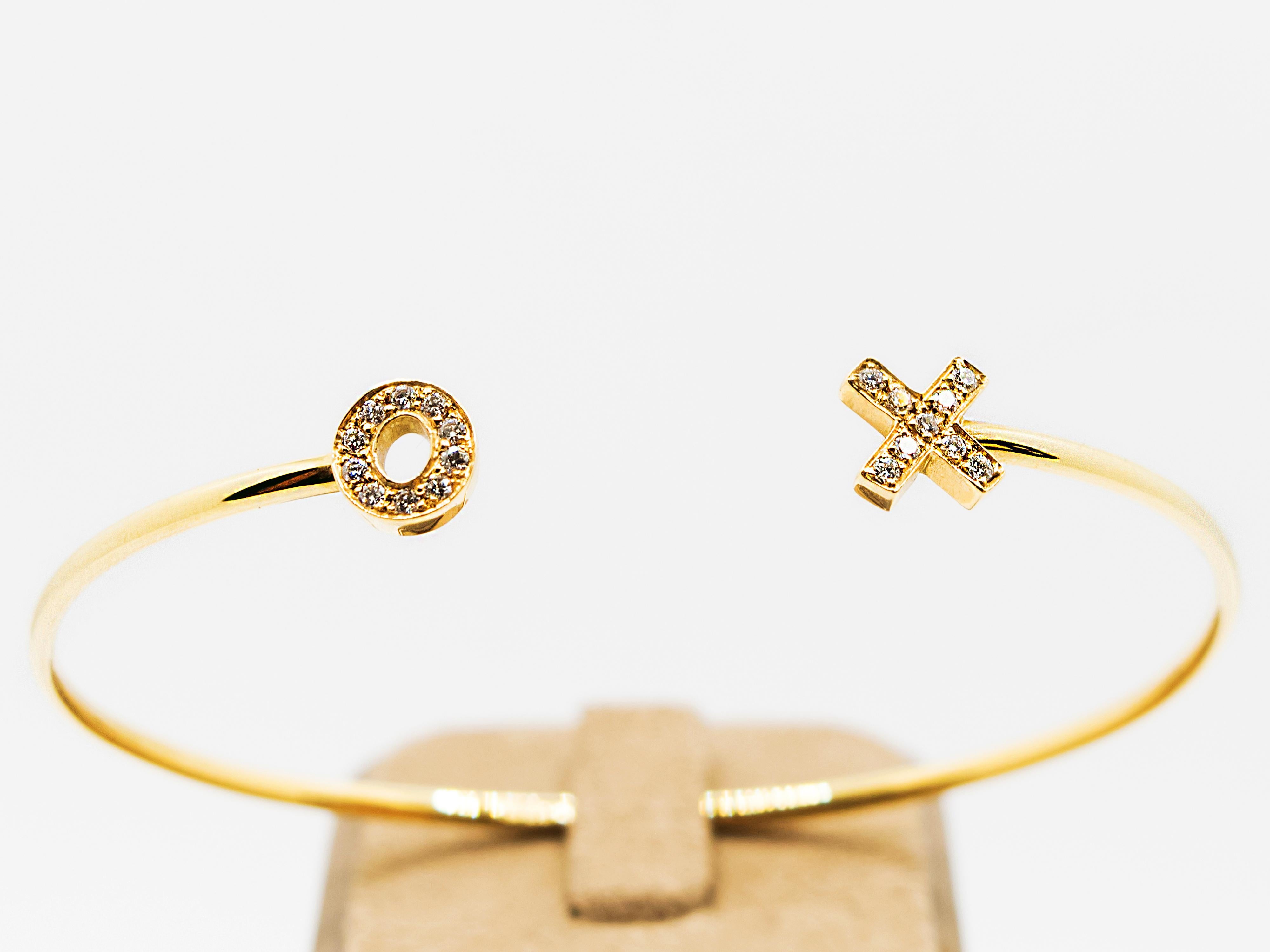 Contemporain Bracelet jonc X O en or jaune 18 carats et diamants en vente