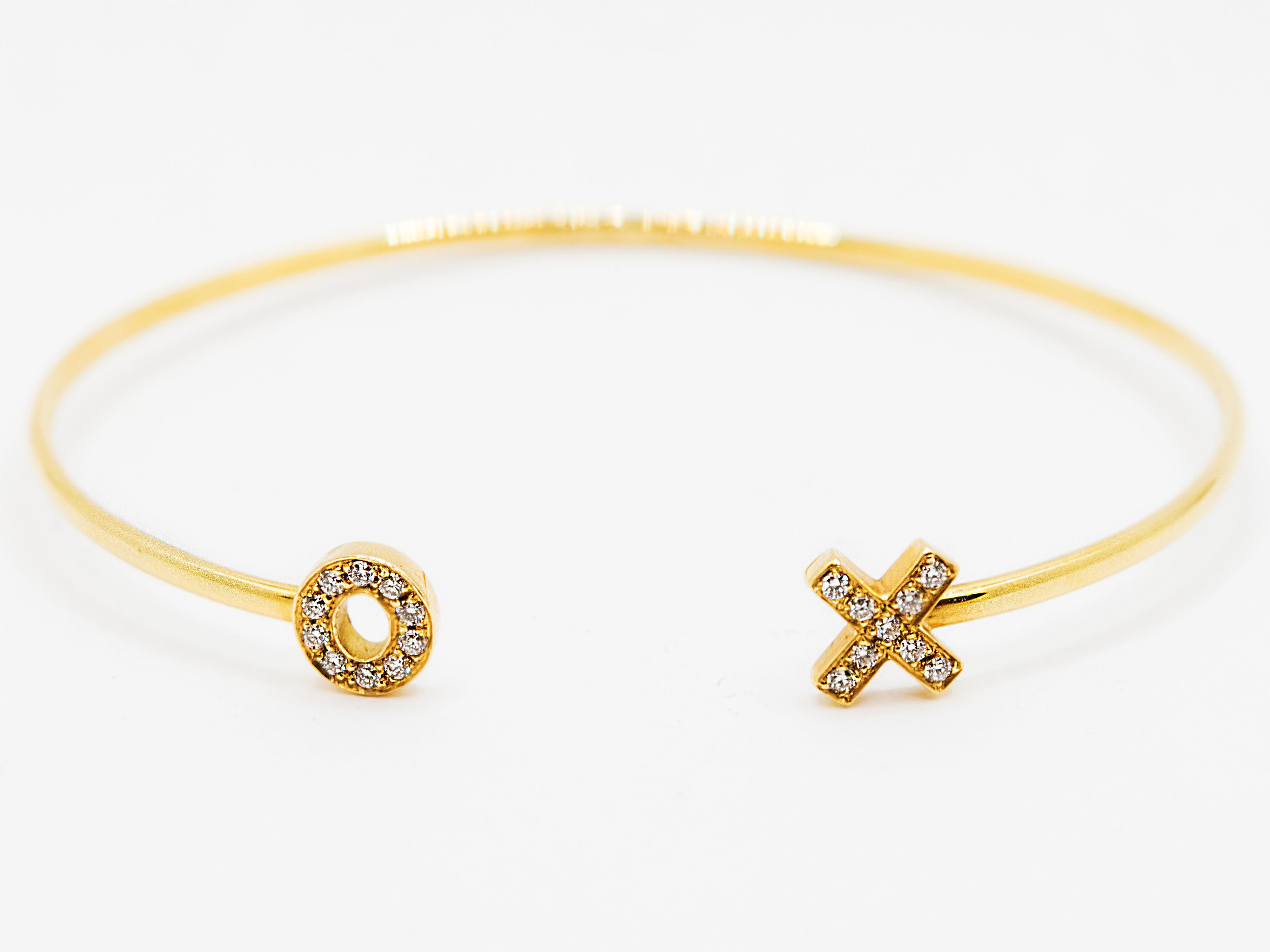 Brilliant Cut Diamonds and 18 Kt Yellow Gold X O Bangle Bracelet For Sale