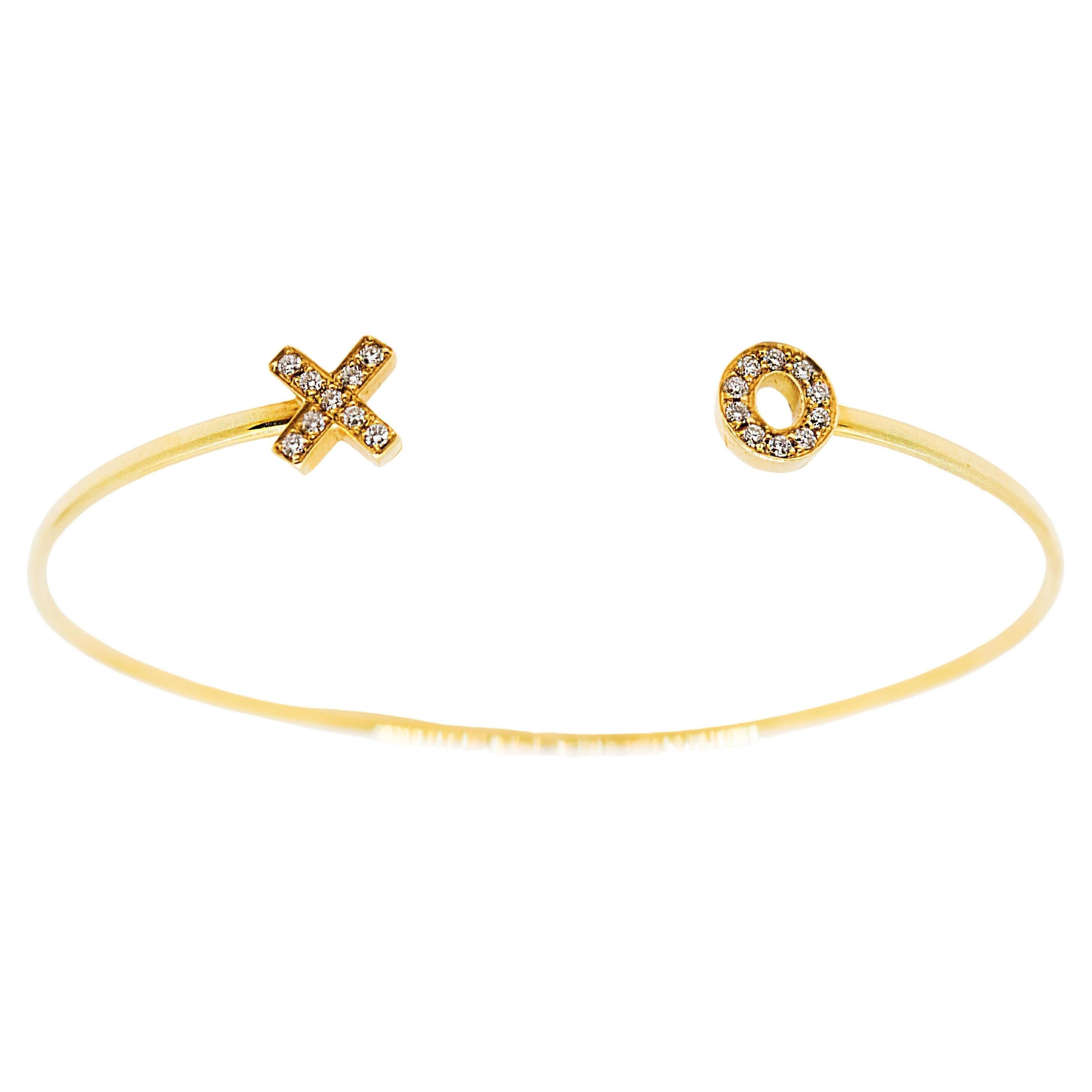 Diamonds and 18 Kt Yellow Gold X O Bangle Bracelet For Sale
