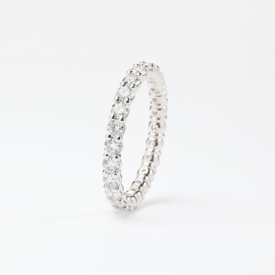 Classic Cushion Shaped Eternity Band Ring, featuring:
✧ Shared prong set natural diamonds weighing approx. 2.10 tcw  (Very Good Cut F-G color, VS1-VS2 clarity)
✧ Number of Set Diamonds: 24
✧ Band width: ~2mm thick 
✧ Approximately 2.65 grams of 18K
