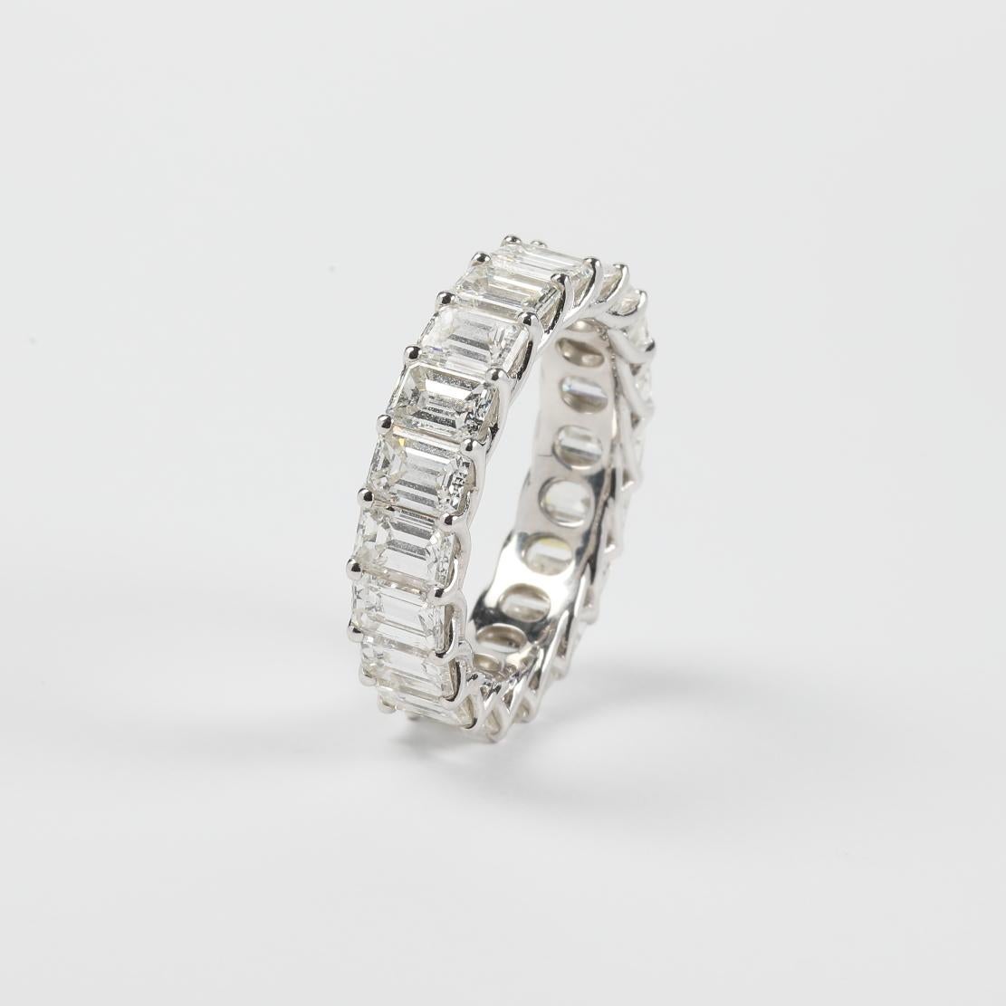 Elegant and Classic Diamonds and 18K White Gold Trellis Eternity Ring Band , featuring:
✧ 20 Shared prong set natural diamonds weighing approx. 6.00 tcw  (F-G color, VS clarity)
✧ Approximately 4.75 grams of 18K White Gold
✧ Free appraisal included