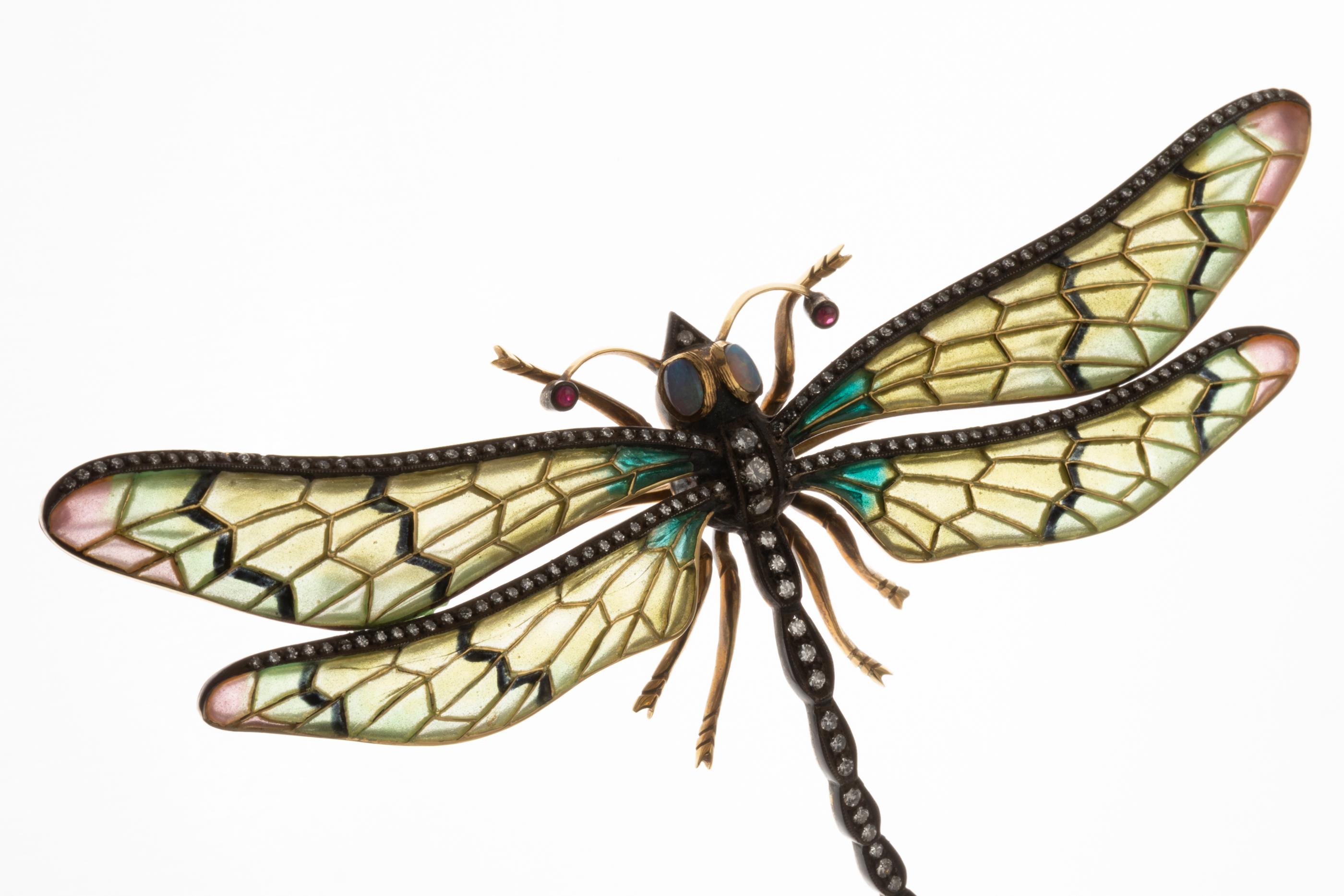 Diamonds and Enamel French Dragonfly Brooch  

Very beautiful brooch, made in France circa 1950. The brooch is big and has presence. Dimensions: 11 * 8 cm or( 4.5 inches ) The brooch is crafted with yellow gold 18k, enamel, diamonds and opals 