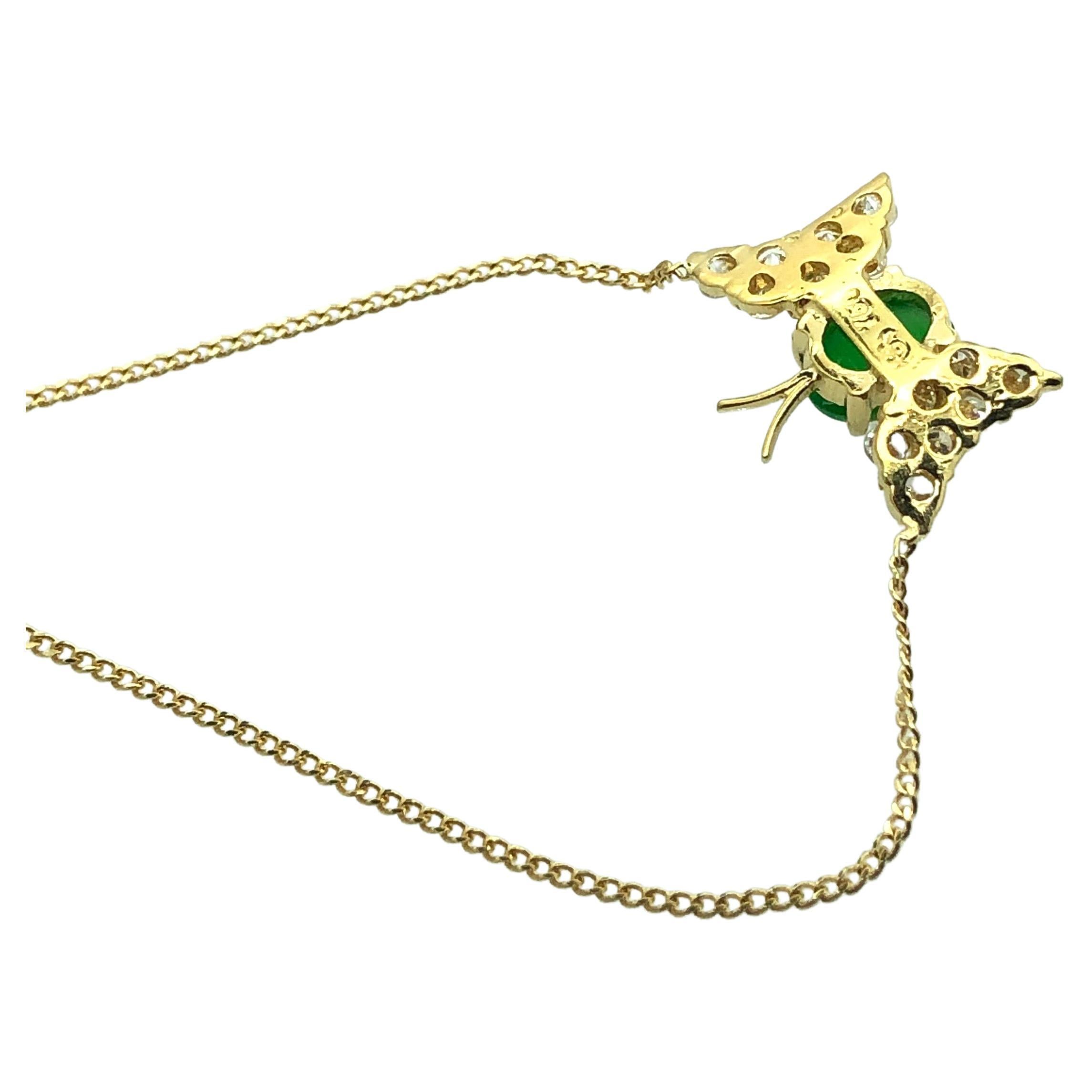 Dainty 18 carat yellow gold Butterfly pendant on 18 carat delicate curb chain.
Butterfly wings are encrusted with 14 brilliant cut diamonds, estimated totalling 0.21 carats.
Butterfly body is set with Jade cabochon, measuring 5.7 mm x 4.00