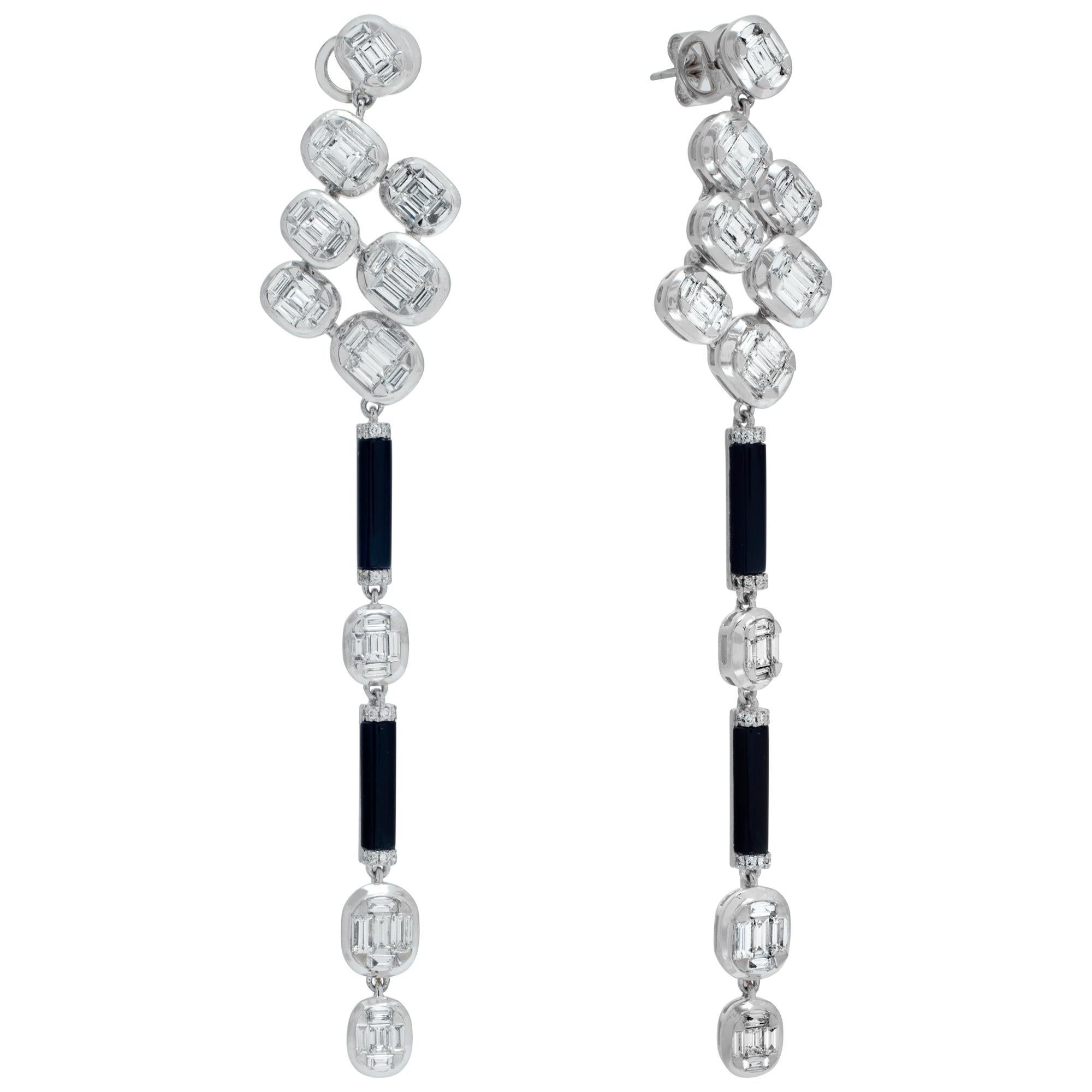 Baguettes, round brilliant diamonds and onyx hanging earrings in 18k white gold. Baguettes and round brilliant diamonds total approx. weight: 3.77 carats, estimate G-H color, VS clarity. Length 3.5 inches.