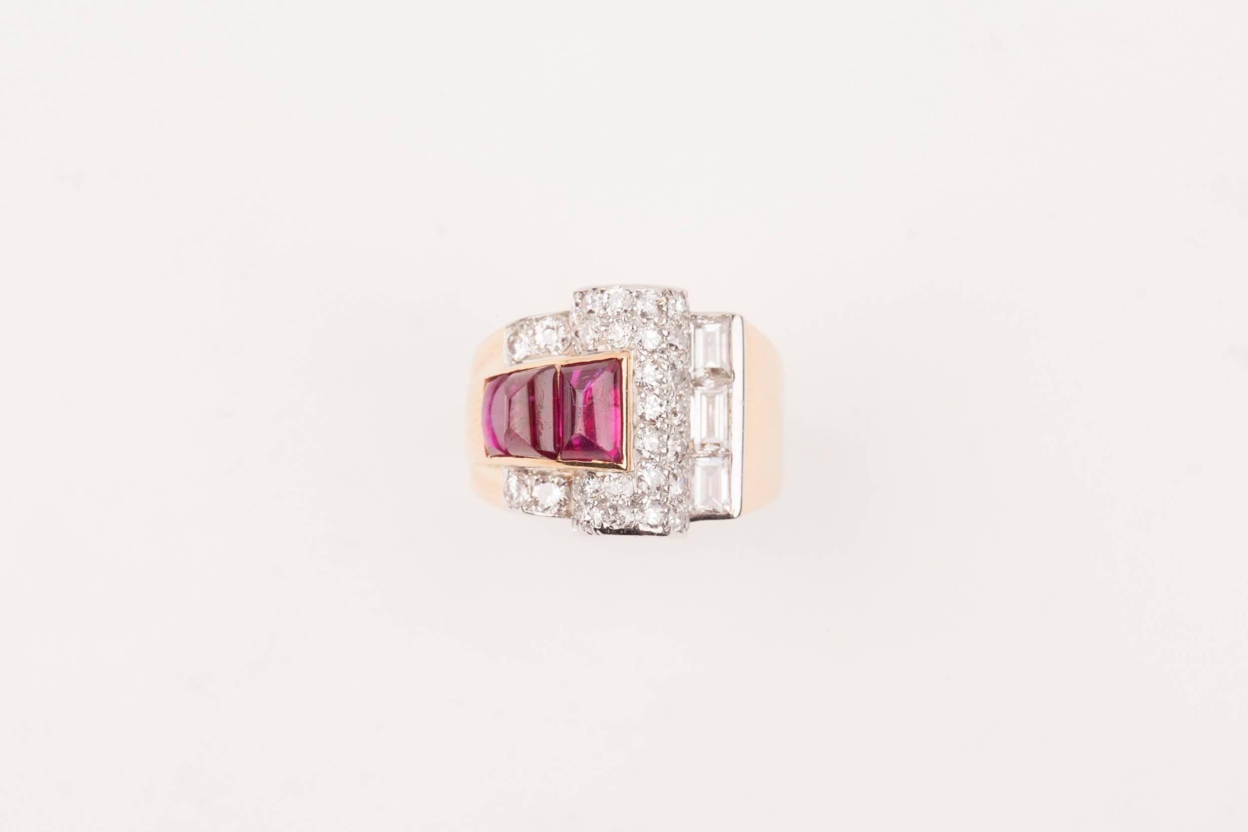 Very chic ring, beautiful Late Art Deco design, circa 1935, gold 18K and platinum. French made.
Set with high quality Diamonds and beautiful natural Cabochon Burmese rubies.
The weight of the rubies is approximately 3 carats.
The diamonds weights