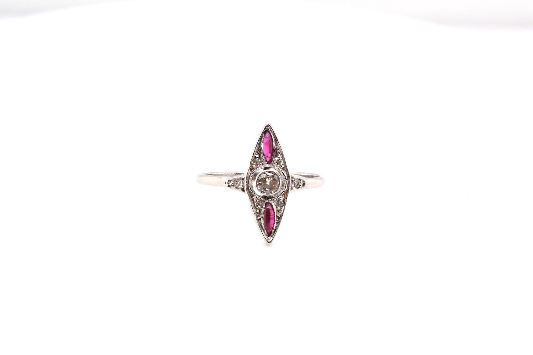 Stones: 1 old cut diamond of 0.20 ct and 2 shuttle rubies of 0.15ct or 0.30ct
Dimensions: 1.8cm x 0.7cm
Material: Gold and silver
Weight: 1.9g
Finger size: 55 and a half (free sizing)
Certificate
Ref. : 24974