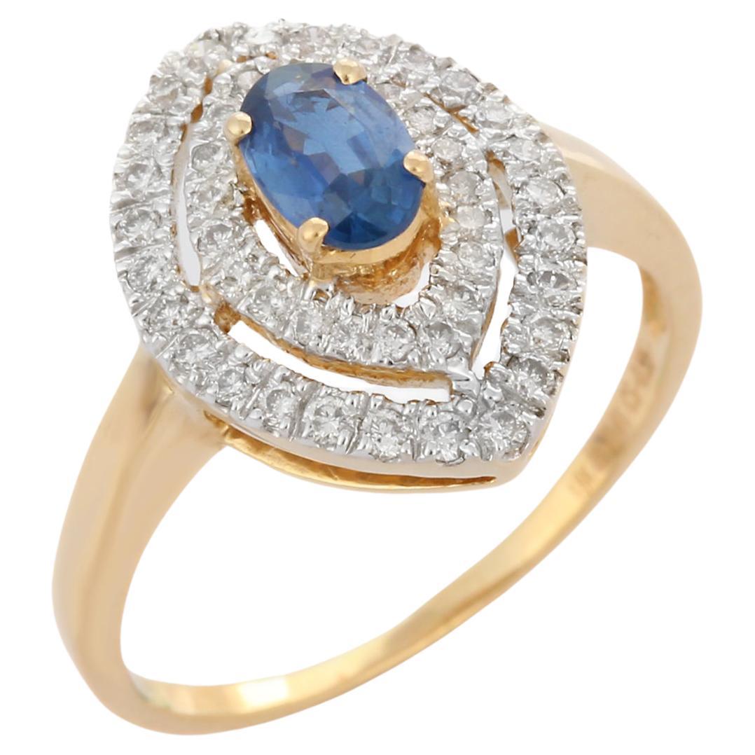 18K Yellow Gold Sapphire Embraced with Diamonds in Marquise Shape Cocktail Ring