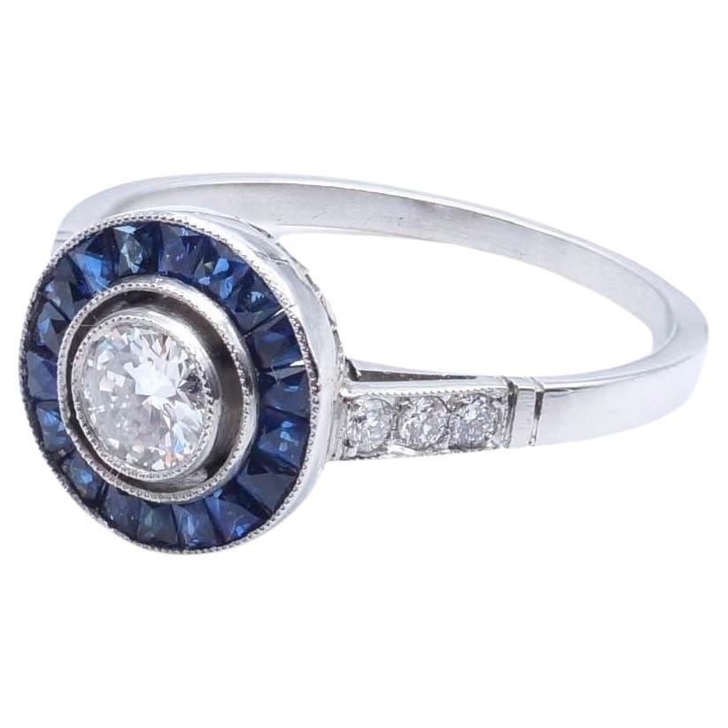 Diamonds and sapphires ring in platinum For Sale