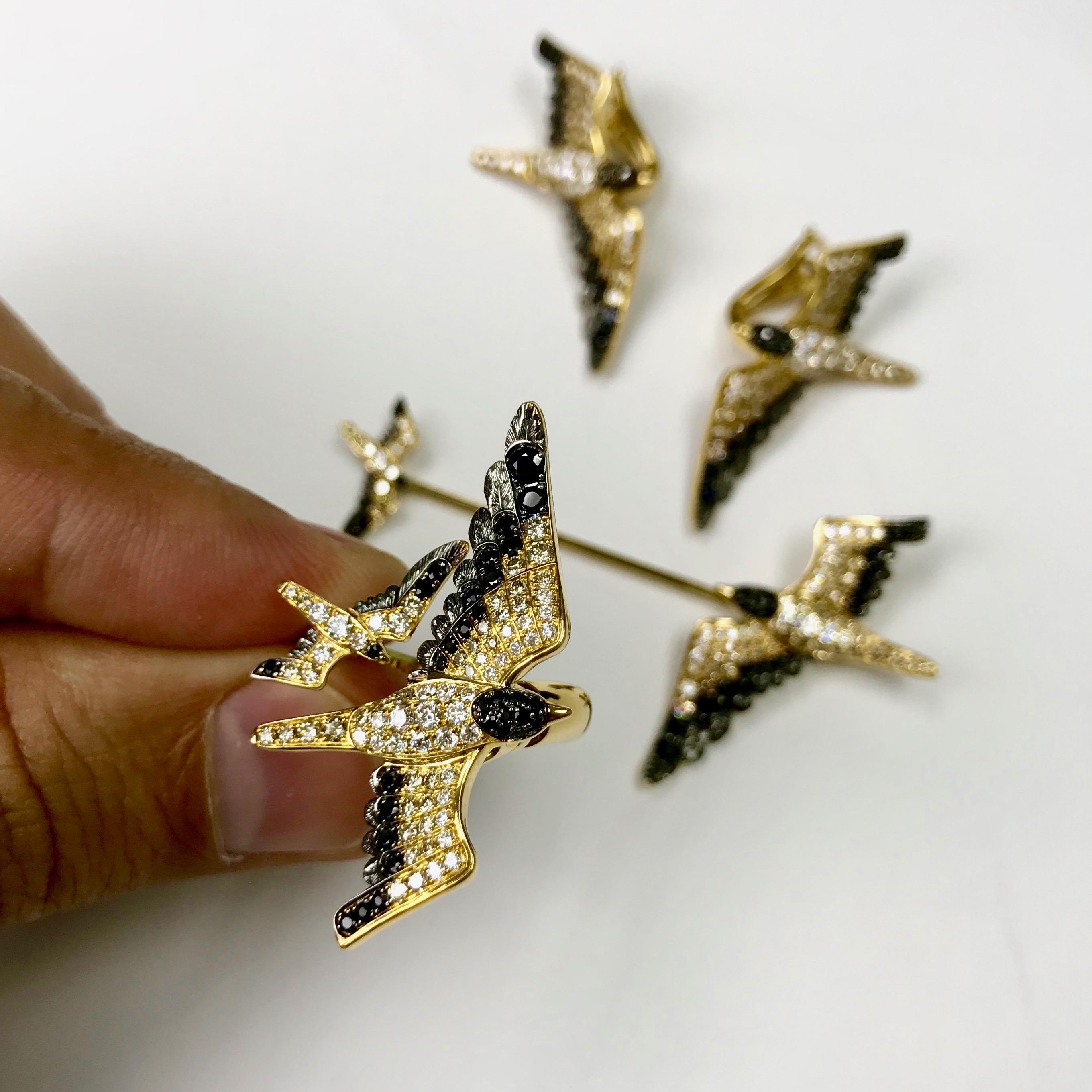 White and Brown Diamonds Black Sapphire 18 Karat Yellow Gold Seagull Suite 
Highly detailed Seagull Suite. Combination of White and Champagne Diamonds gives fully impression that they are alive. Ring suites your finger perfectly. This Pin represents