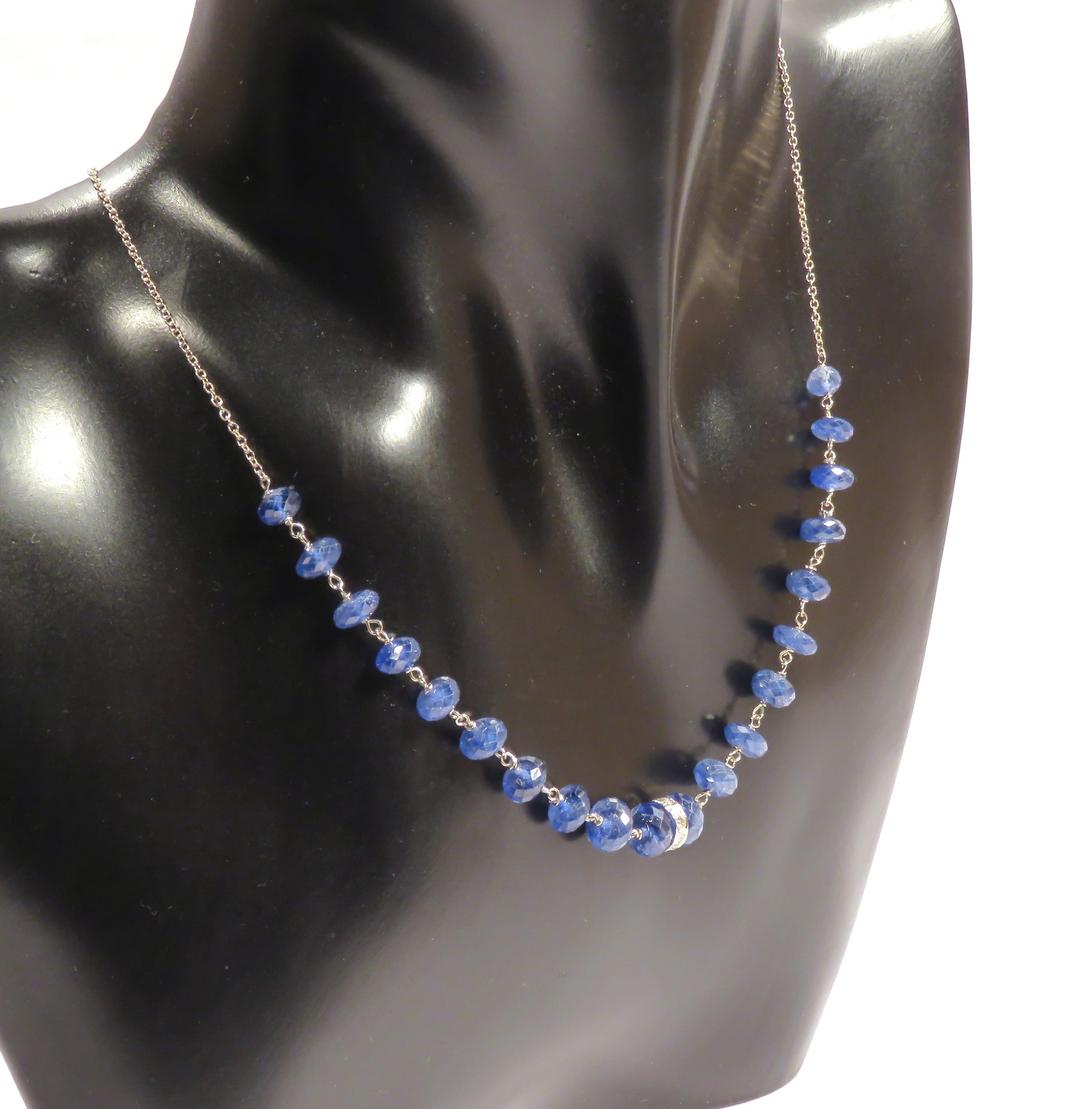 Attractive choker necklace crafted in 9 karat white gold with brilliant cut diamonds and faceted blue sapphires. The length of the necklace is from 410 mm to 430 mm / from 16.141 inches to 16.929 inches. It is handmade in Italy by Botta Gioielli and