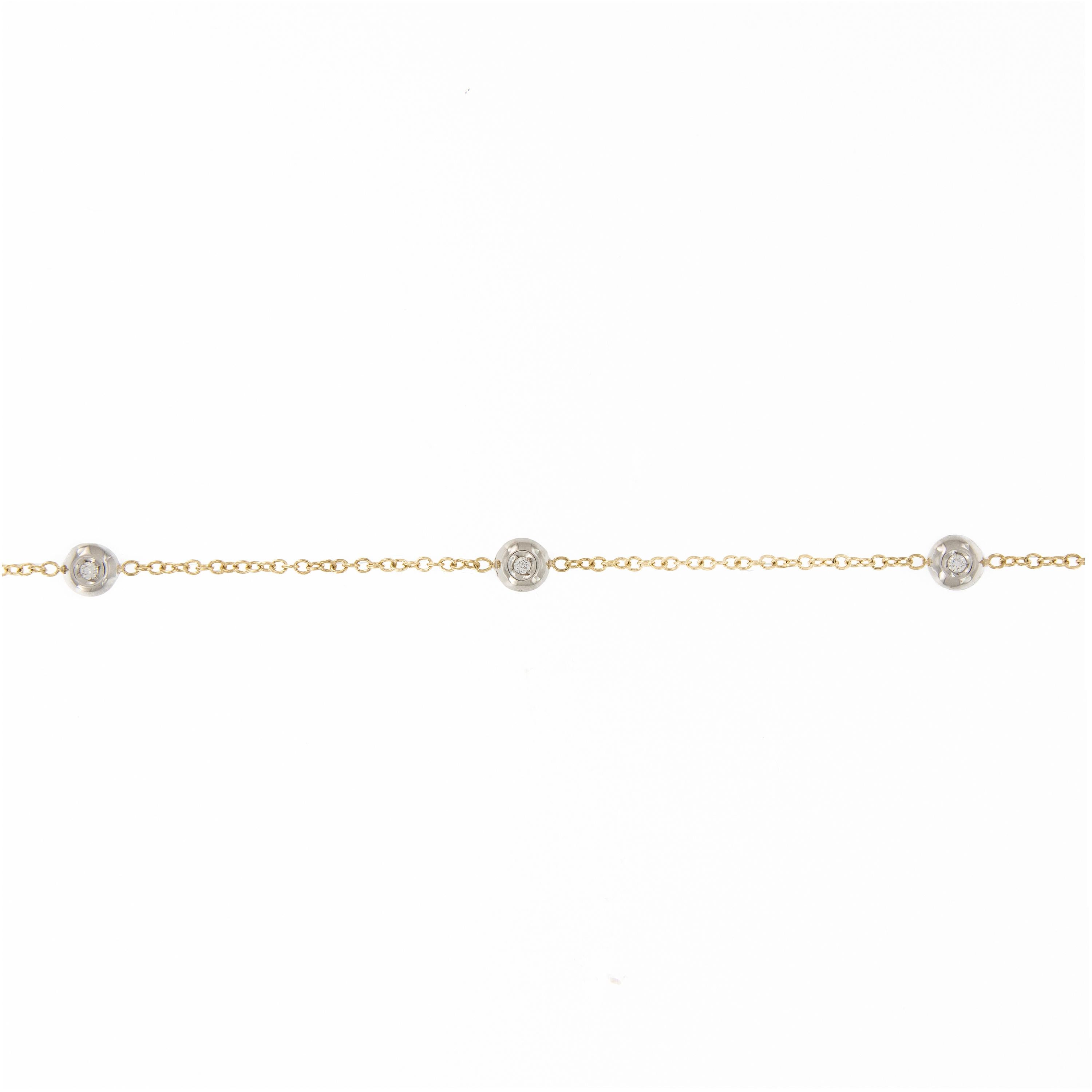 Classic and perfect for everyday! Diamonds by the yard necklace features 20 diamonds bezel set in 18k white gold and a 18k yellow gold chain. Please note the diamonds are on both sides. Measures 18 inches long. Weighs 7 grams.

Diamond 0.44 ct