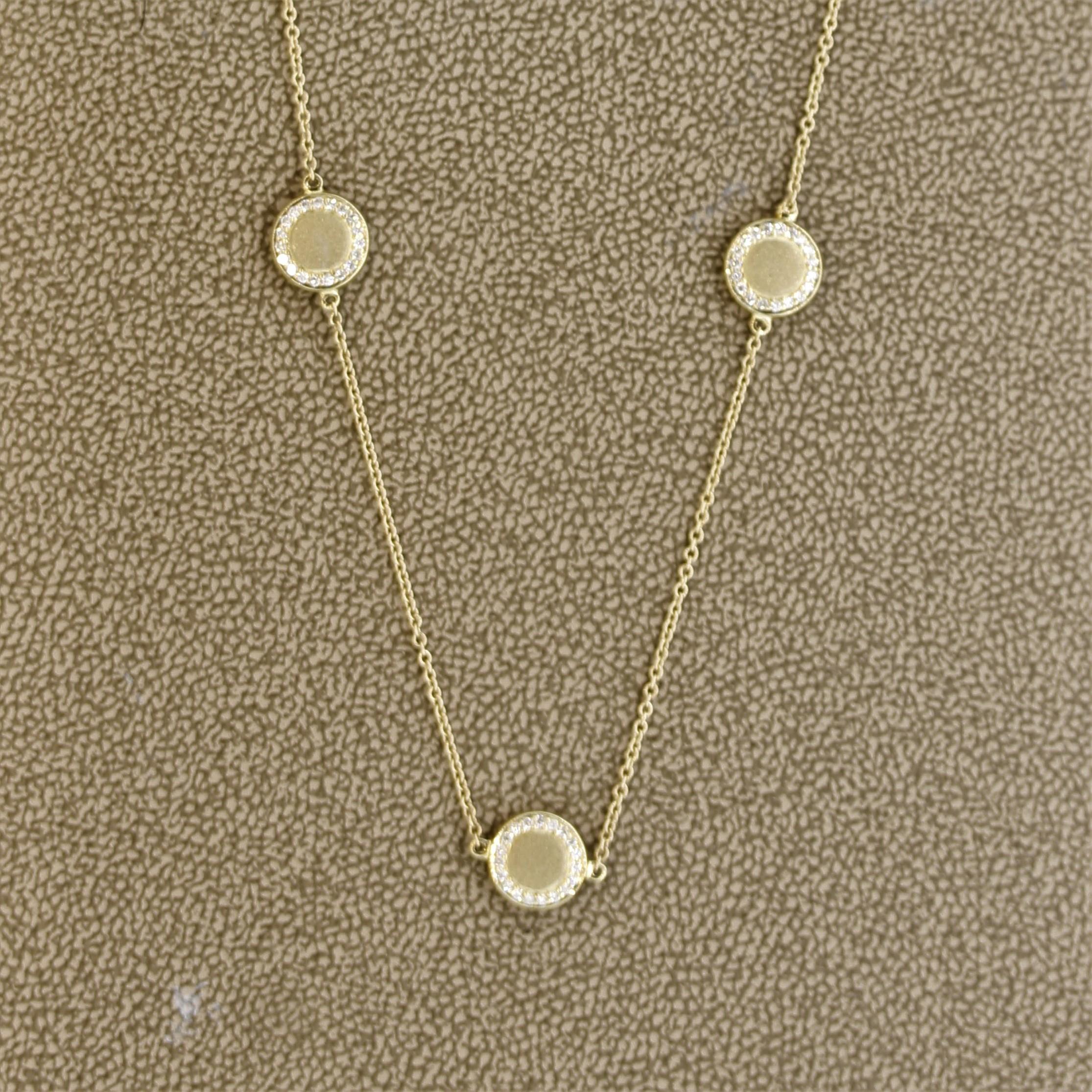 A sweet necklace in the Diamonds by the Yard style. It features 10 round gold medallions which are set with round brilliant cut diamonds, a total of 1.61 carats. Made in 14k yellow gold and measuring 32 inches long, this stylish necklace will