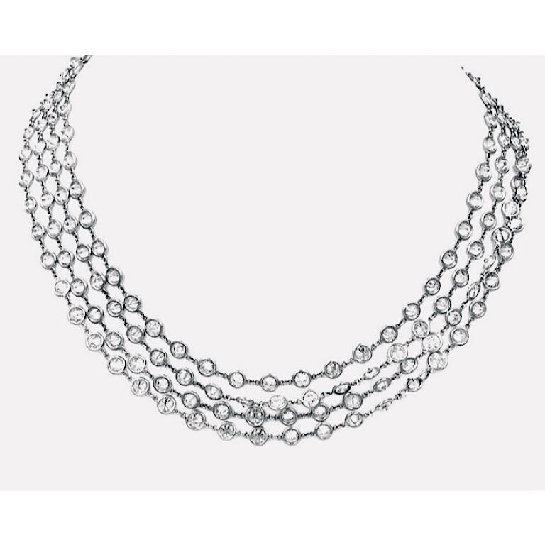 A fabulous and amazingly long platinum and diamond chain. This elegant platinum and diamond chain is made up of GH color, VS and a few SI clarity diamonds. There are 193 diamonds in the chain. Each round brilliant cut diamond is carefully set in a