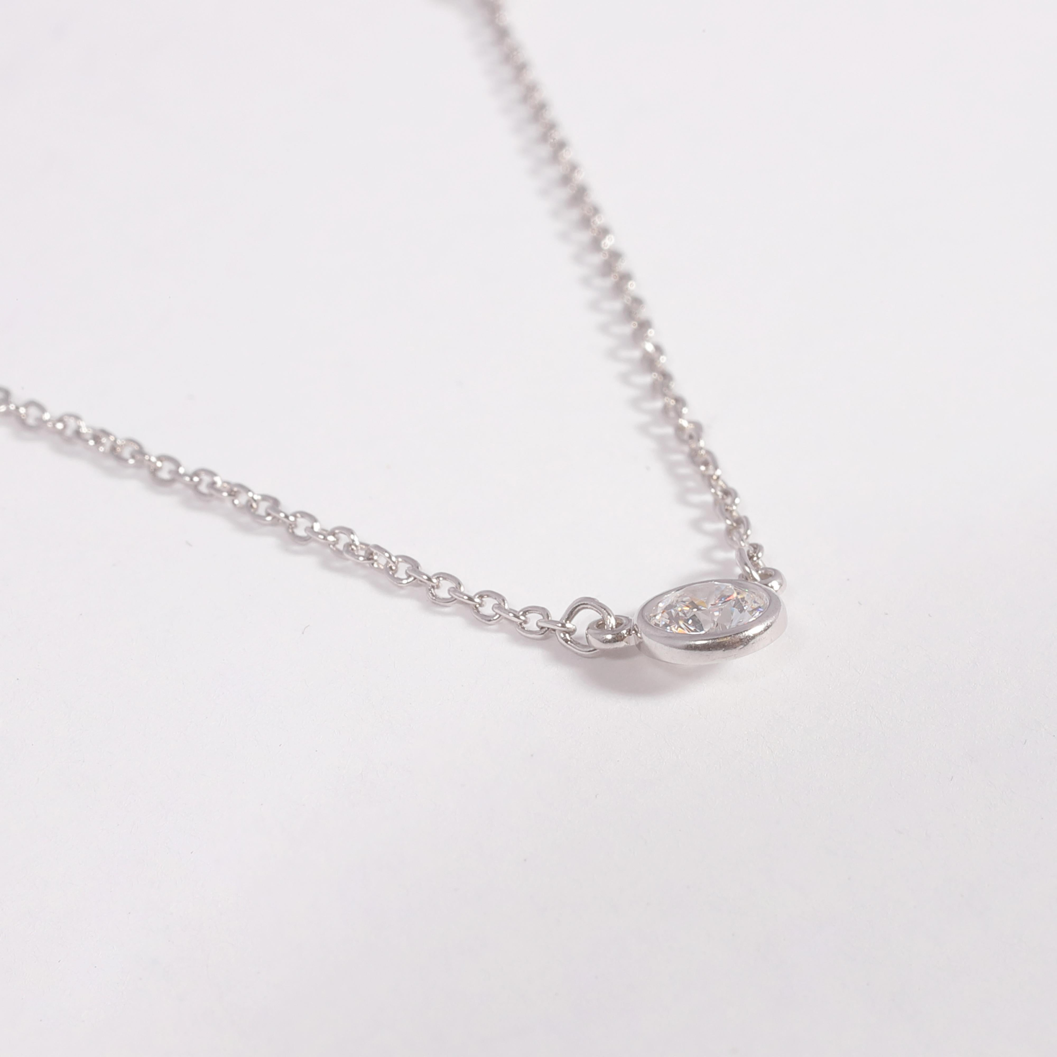 Always popular and classic!  This 16 1/2 inch platinum necklace supports 0.54 carats of diamonds stated to be G in color and VS 1 - VS 2 in clarity.