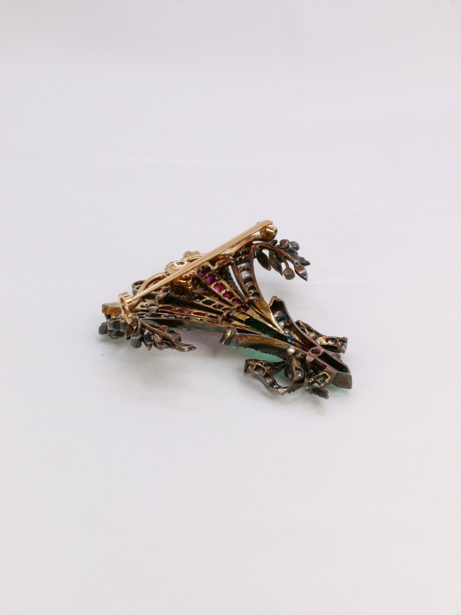 Diamonds, Colombian emeralds, Burmese rubies antique brooch For Sale 1