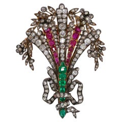 Diamonds, Colombian emeralds, Burmese rubies antique brooch