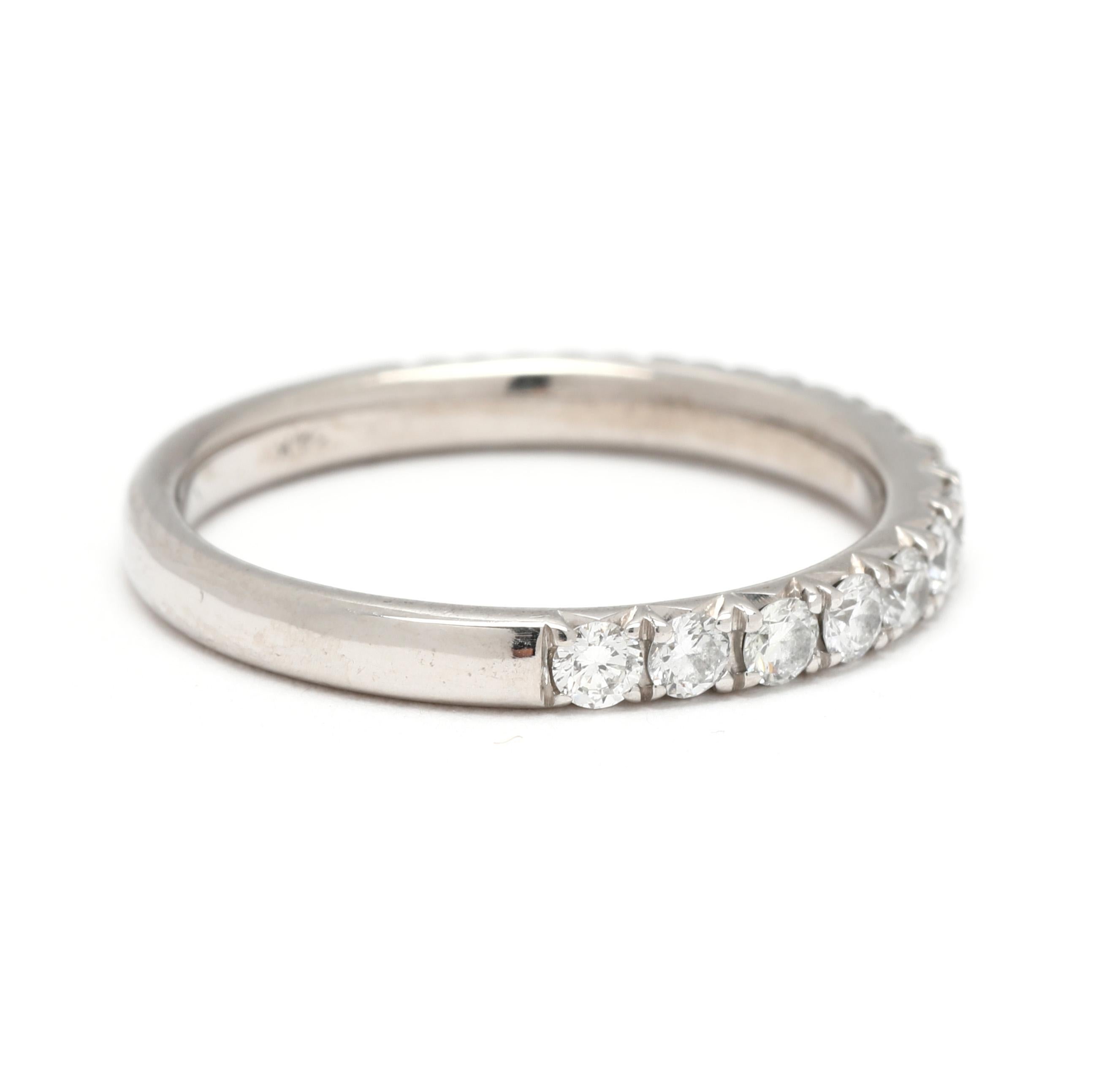 Stones:
diamonds, 15 stones
round brilliant
2 mm
approximately .50 total carats
G-H color, VS2-SI1 clarity

Ring Size 5.25

Rise Off Of Finger: 2.1 mm

Width: 2.3 mm

Weight: 1.2 dwts. / 1.8 grams

Stamps: 