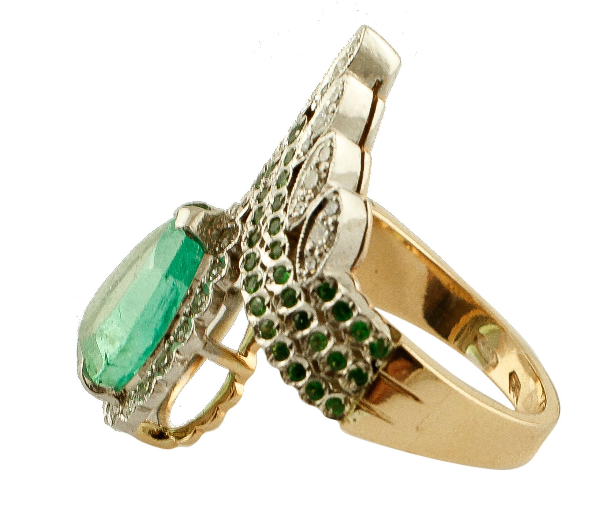 Vintage ring in 9k rose gold and silver structure, mounted with an emeralds drop surrounded with diamonds, and tsavorite and diamonds along the ring structure .
The origin of this particular ring goes back to the 1960s, it was created and totally