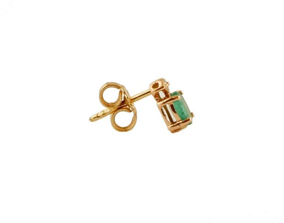 Gorgeous stud earrings in 14 kt rose gold structure mounted with, an oval emerald and, on top of it, a little diamond.
These earrings are totally handmade by Italian master goldsmiths.
Diamonds 0.05 ct, huit huit cut, G Color, VS Clarity
Emeralds