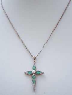 Diamonds, Emeralds, Pearl, Rose Gold and Silver Cross Pendant.