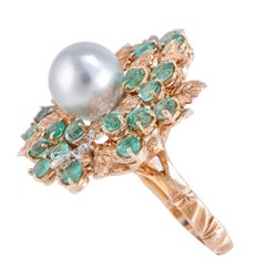 Diamonds Emeralds Pearl White and Rose Gold Ring