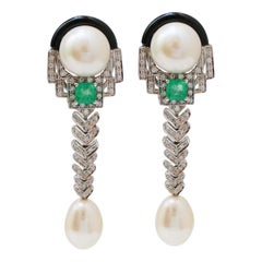 Diamanti, smeraldi,  Orecchini pendenti in perle, onice, platino e oro bianco 14 Kt