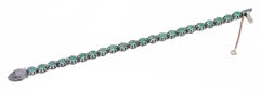 Diamonds, Emeralds, Rubies, Rose Gold and Silver Snake Bracelet.