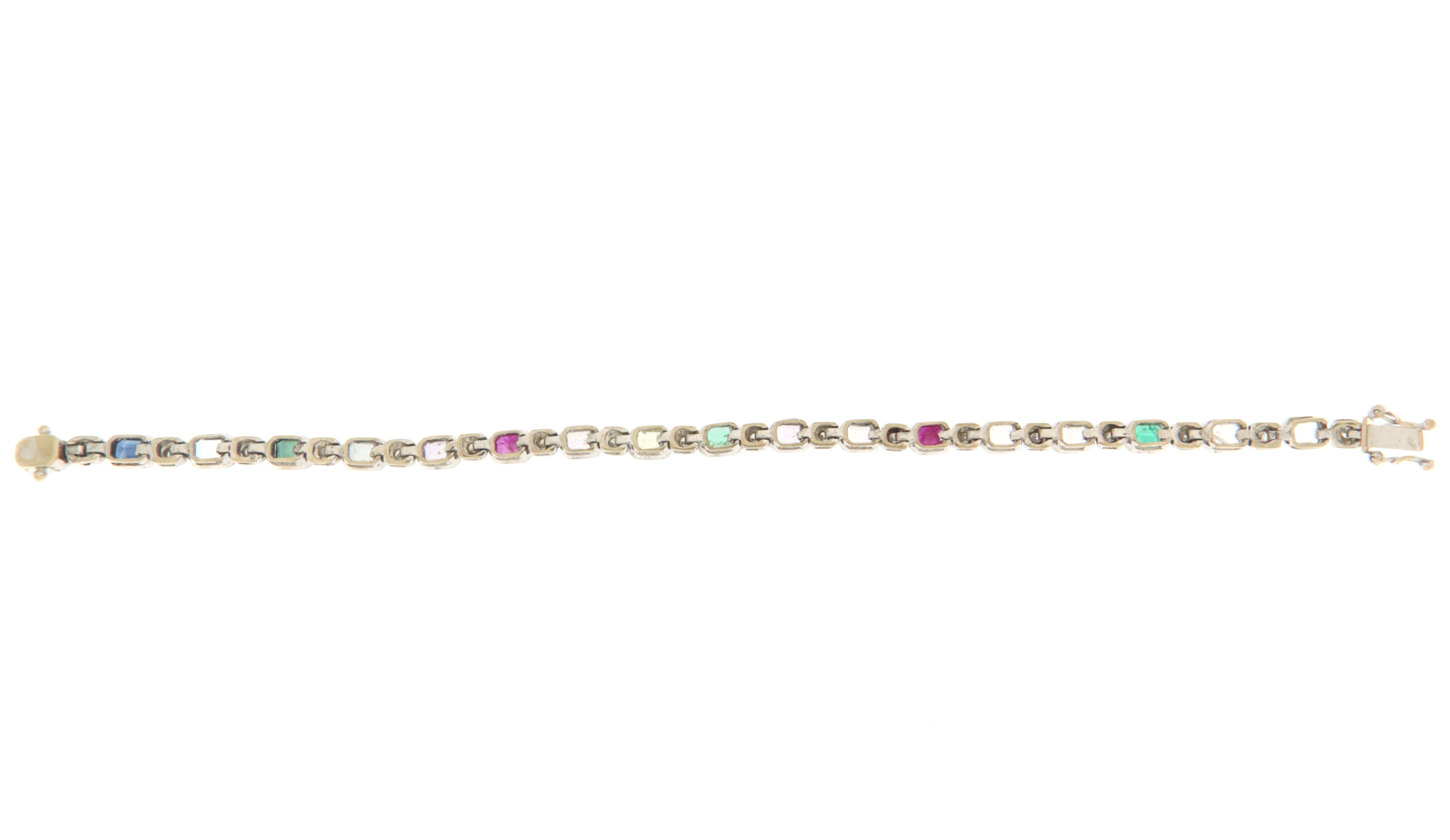 Contemporary Diamonds Emeralds Rubies Sapphires White Gold 18 Karat Tennis Bracelet For Sale
