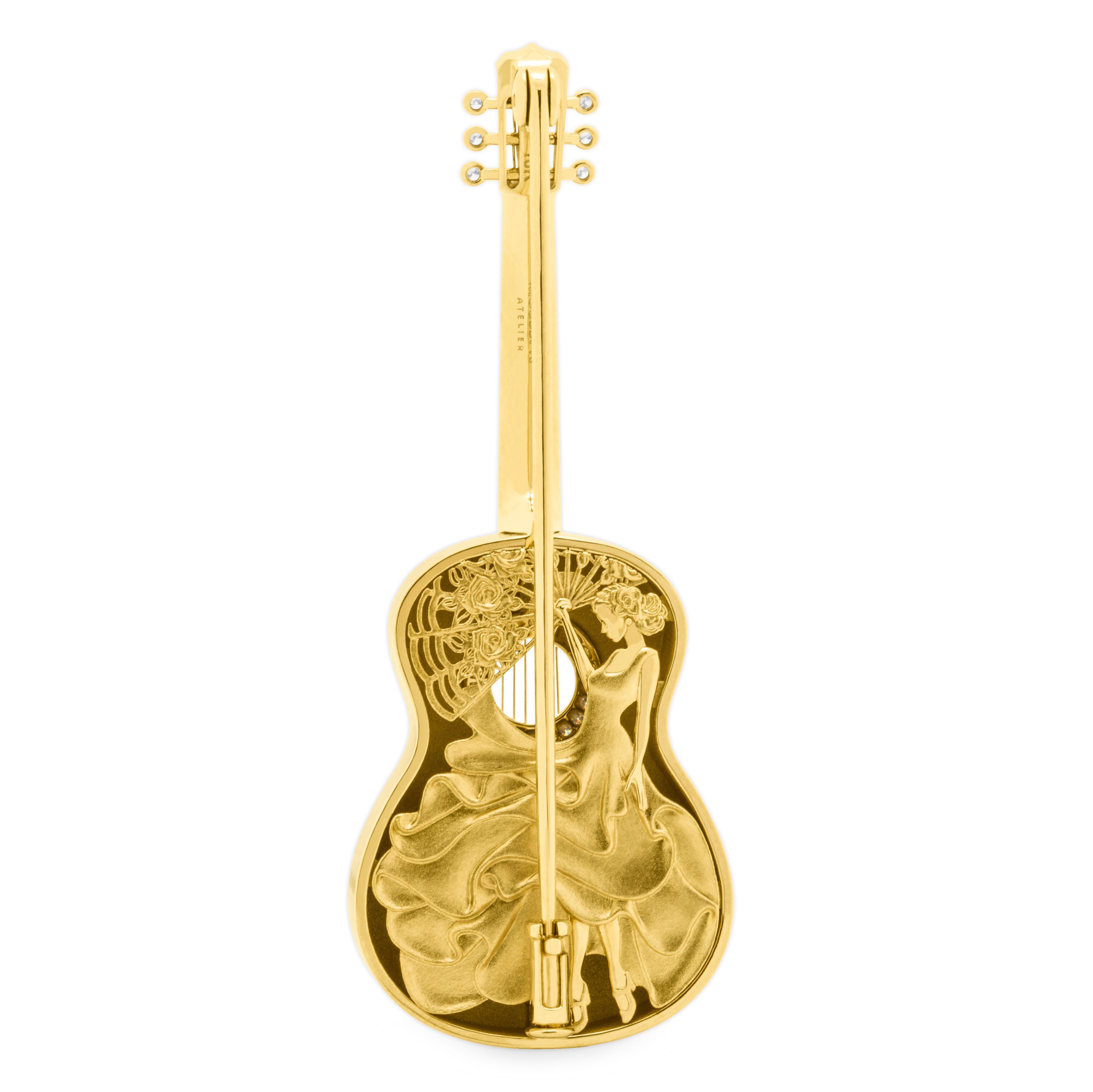 Gitarrenbrosche aus 18 Karat Gelbgold mit Diamanten und Emaille

Neue Brosche in unserer Collection 