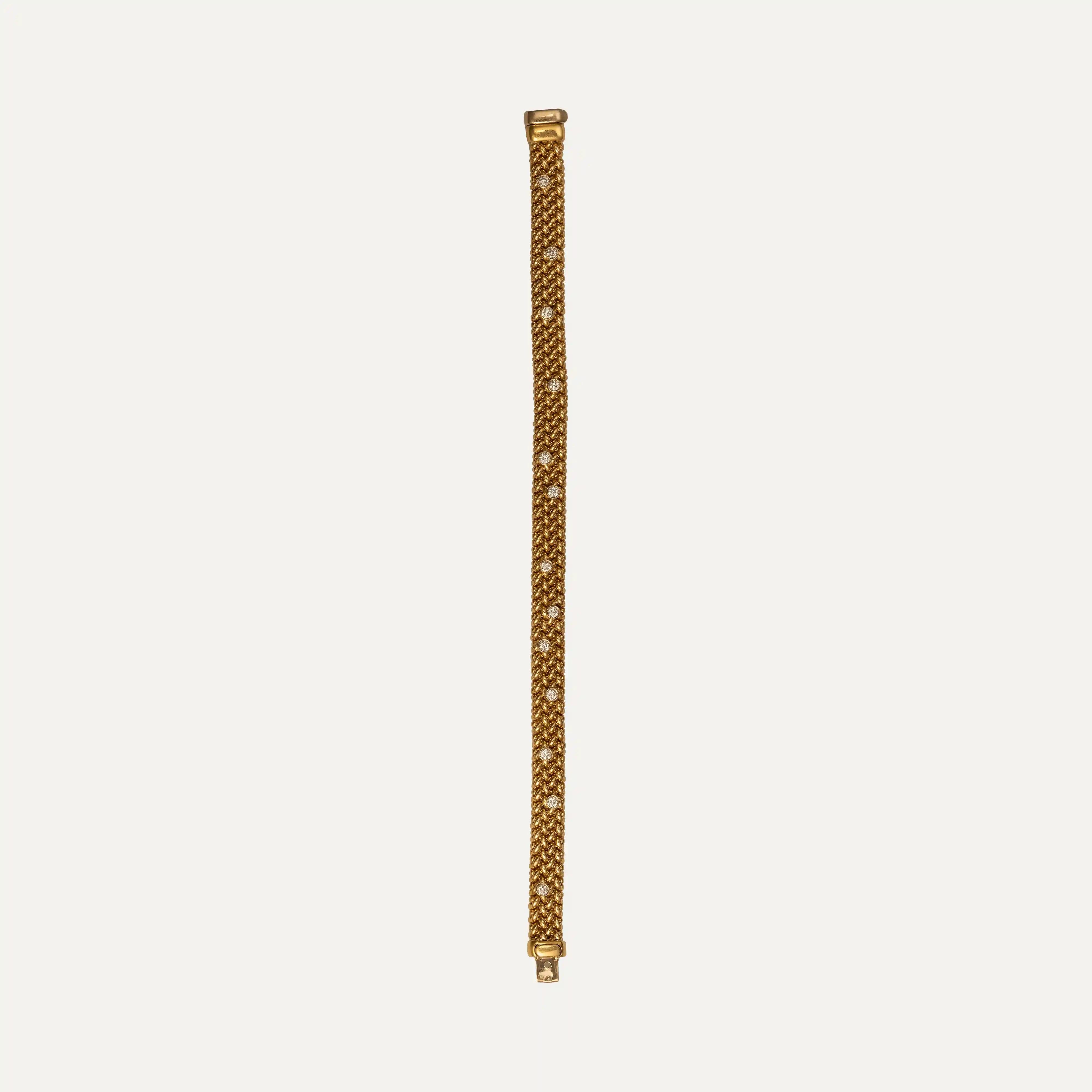 
18kt – 750‰ yellow gold bracelet, set with 13 