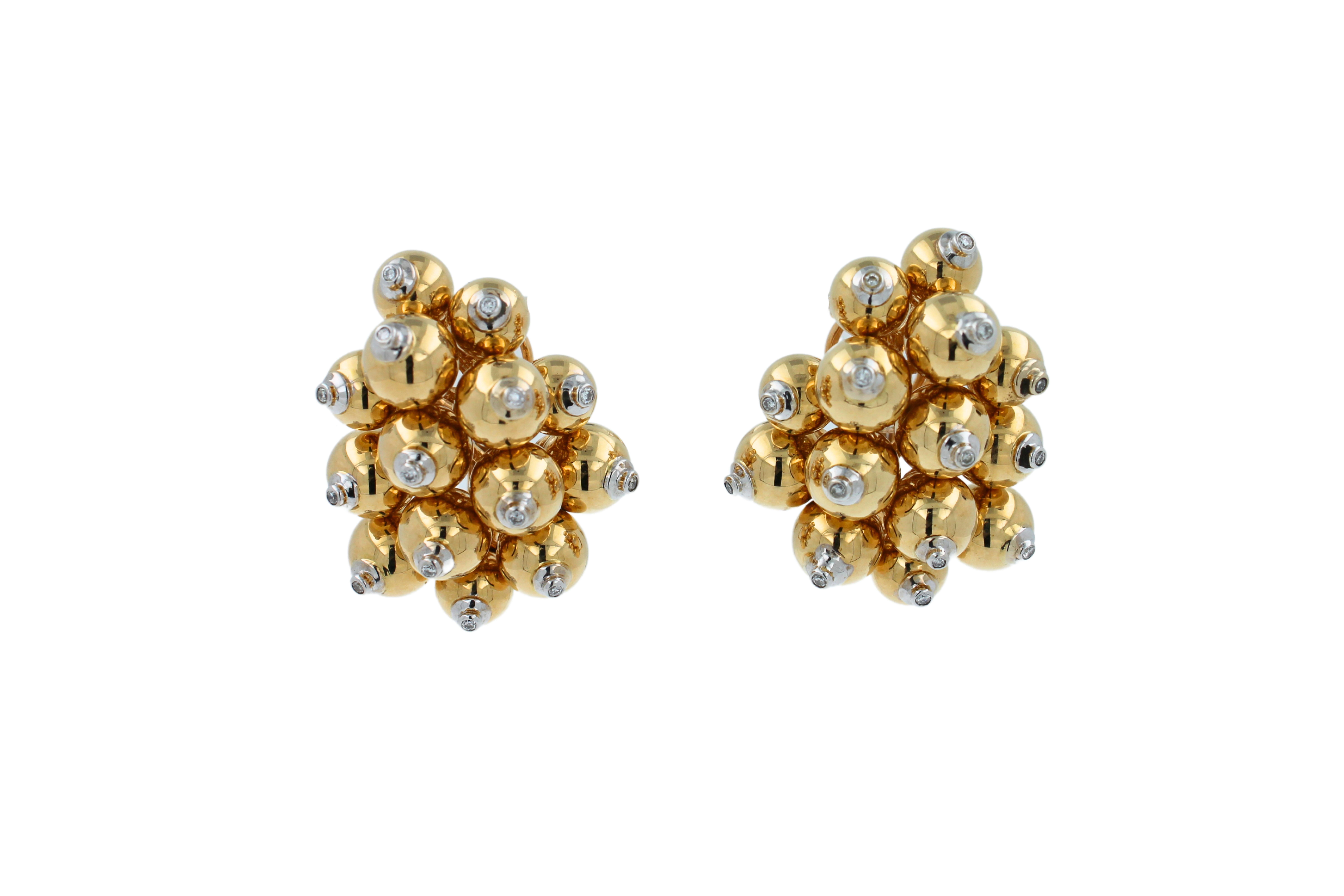 Very Beautiful, Unique, High-End Craftmanship with a polished finish. A versatile high-luxury fine earrings that can be worn with any outfit.
32.88 grams
18K Yellow Gold & 18K White Gold Details 
0.15 cts Diamonds F/VS
3.5 front length of earrings
