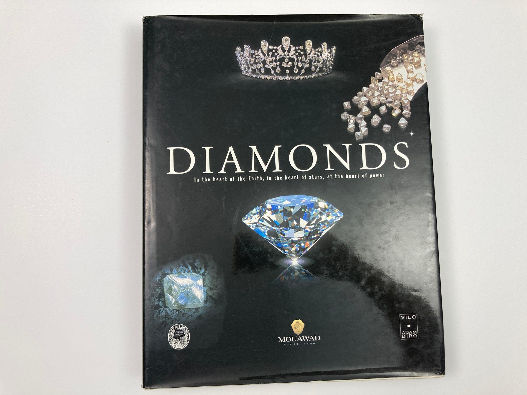 Diamonds: In the Heart of the Earth, in the Heart of Stars, at the Heart of Power Hardcover Book.Mouawad first edition december 1, 2001 by Hubert Bari (Author), Violaine Sautter (Author).Patrick Absalon, Hubert Bari, Michele Bimbenet-Privat, Robyn