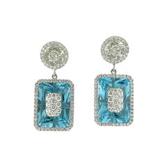 Diamonds Inlaid Into White Quartz and Emerald Cut Blue Topaz Earrings