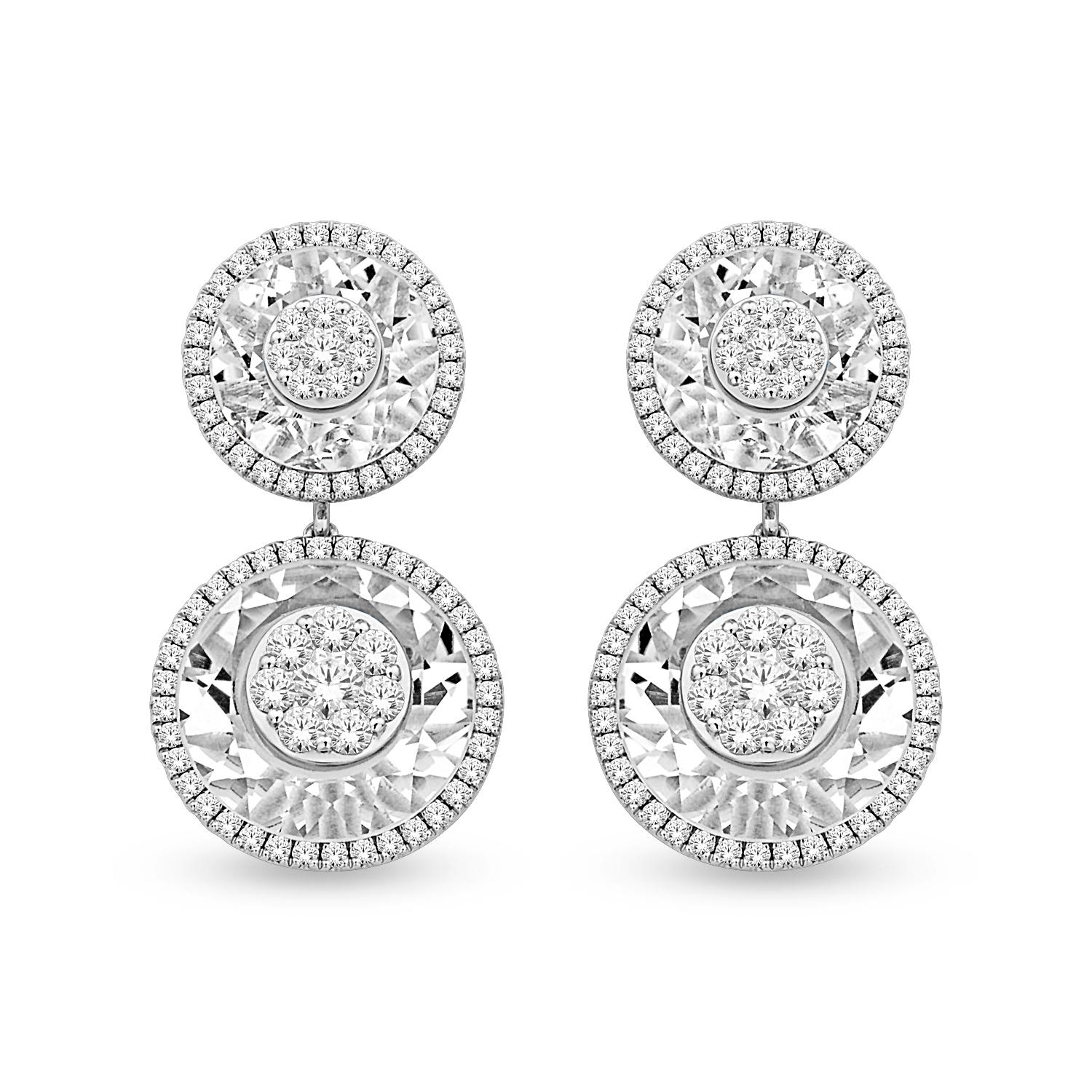 From our signature Bhansali One collection, this earring features clusters of G,VS diamonds (2.5cts) inlaid into special cut white quartz (16.25cts). We love our white quartz because it looks like one big diamond. We also pay special attention to
