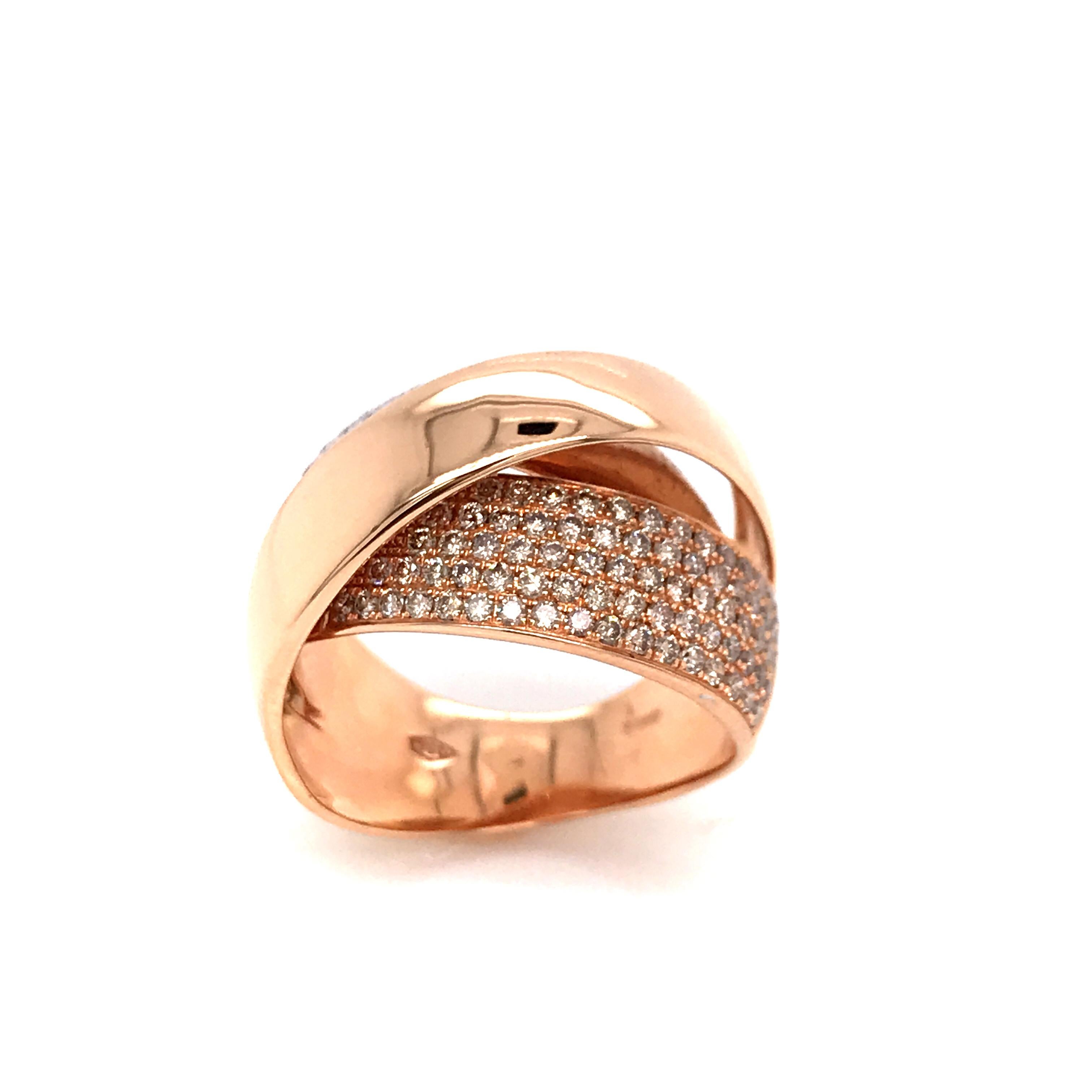 Welcome to mesure et art du temps, your premier destination for the most elegant and unique fashion jewelry. We are delighted to present you with this magnificent interlaced ring in 18-carat rose gold, featuring brilliant diamonds totaling 1.18