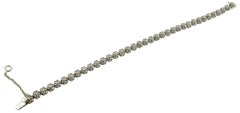 Bracelet à maillons en or blanc 14 carats, diamants et saphirs bleu clair