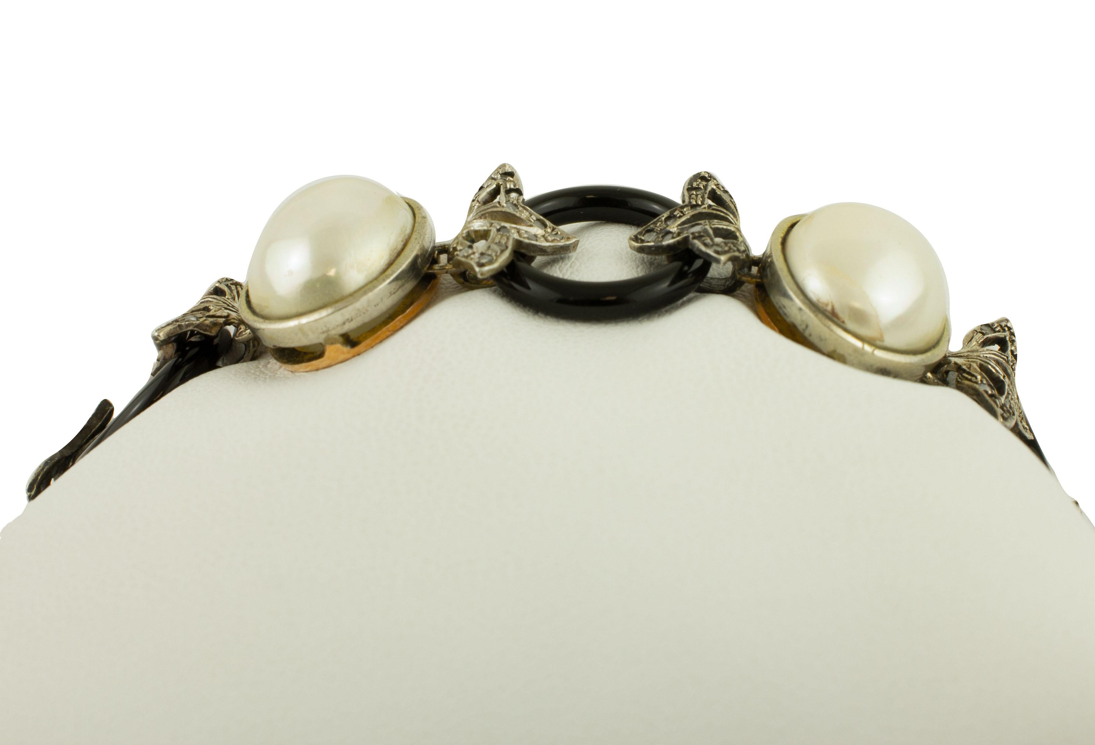 Gliederarmband aus 9 Karat Roségold und Silber mit Diamanten, Onyxringen, weißen Perlen und Silber (Retro) im Angebot