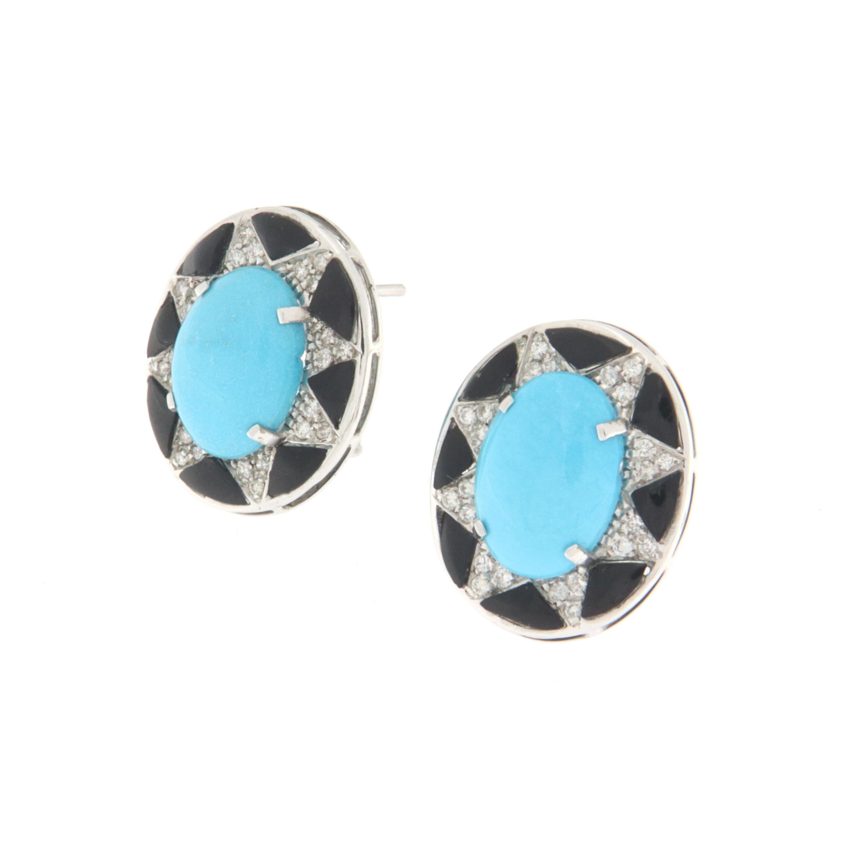 18 Karat white gold stud earrings. Handmade by our craftsmen and assembled with onyx, turquoise and diamonds.

Diamonds weight 0.40 karat
Turquoise weight 1.60 grams
Earrings total weight 10 grams

