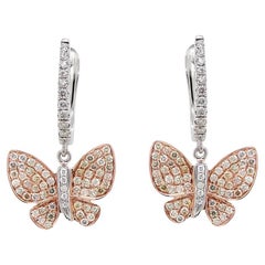 Orecchini a goccia con pavé di diamanti e farfalla in oro bianco e rosa 18 carati